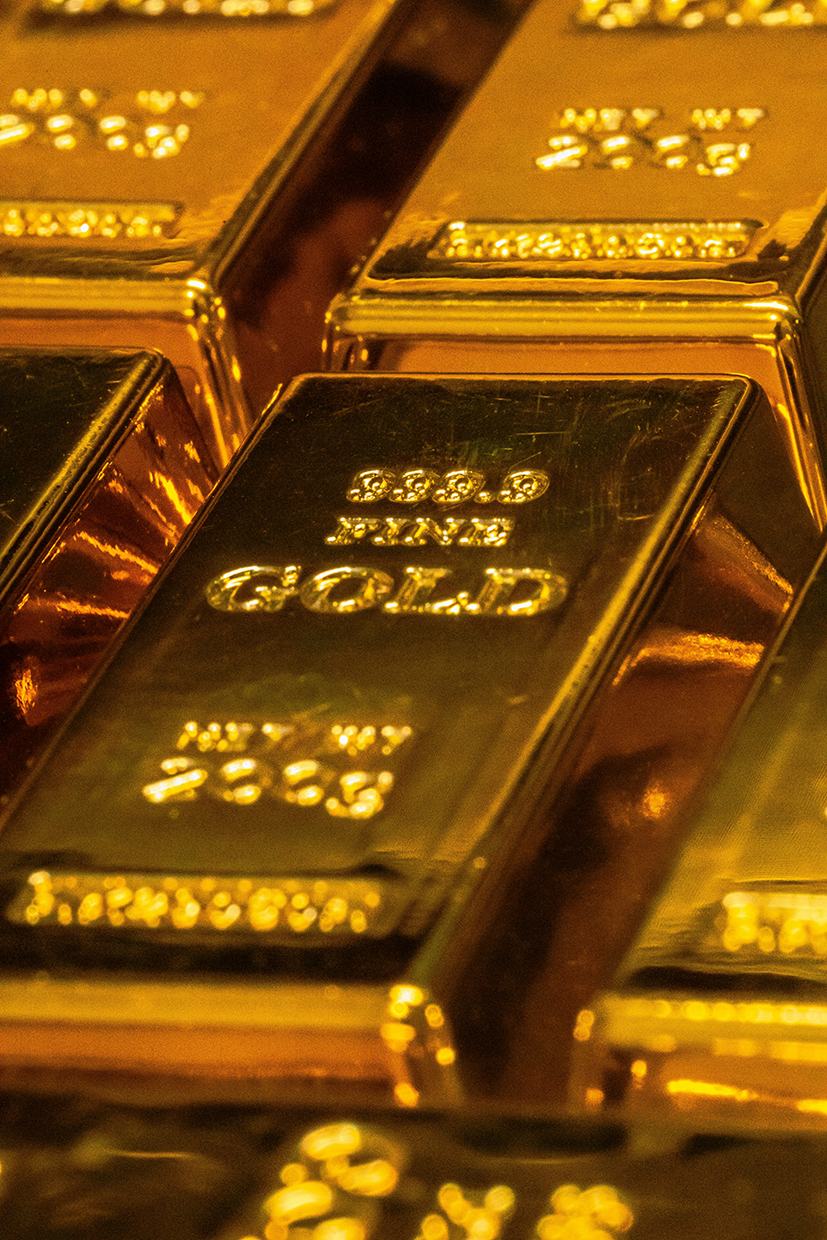 Stacked 999.9 fine gold bars ready for trade