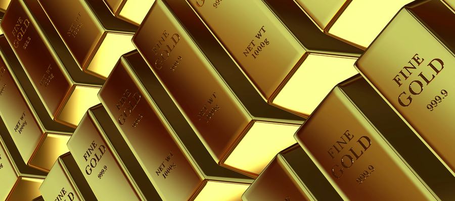Gold bars stacked in a secure warehouse storage facility
