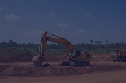 Heavy excavation equipment operating at a mining site